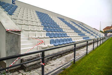empty chairs at the pandemic football stadium in the world. coronavirus. there are no people.