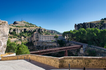 Canonigos street, San Pablo bridge and in the background the national parador tourism of Cuenca, Spain