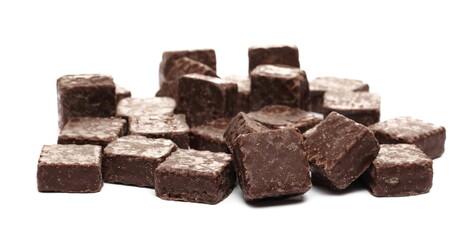 Chocolate wafer blocks, cubes pile isolated on white background