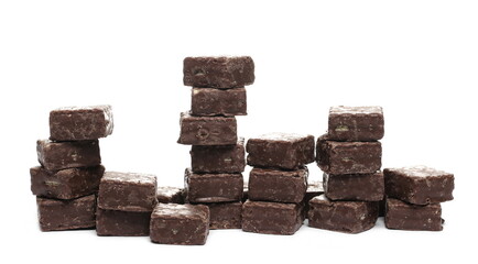 Chocolate wafer blocks, cubes pile isolated on white background