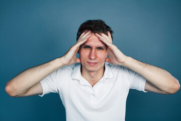 young goofy man with pimples pointing gesturing in studio, stupid bookwarm little crazy, lifestyle...