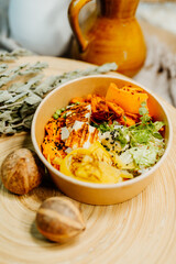 Healthy vegetarian food for a balanced diet rich in vitamins. Organic and regional products. Tofu, carrots and sweet potatoes