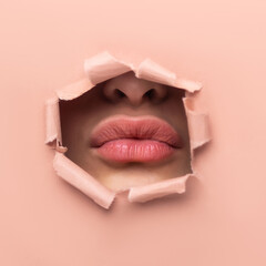 Beautiful girl plump young lips on a beige background close-up. Cosmetology injection augmentation concept. Plastic increase in lip volume. Care cosmetics balm. Copy space banner  place for text  - obrazy, fototapety, plakaty