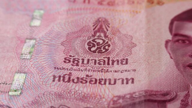 Monogram of King Maha Vajiralongkorn on 100 baht banknote. Paper thai bill