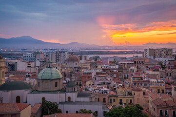 Obraz premium Cagliari Castello sunset, evening panorama of the old city center in Sardinia Capital