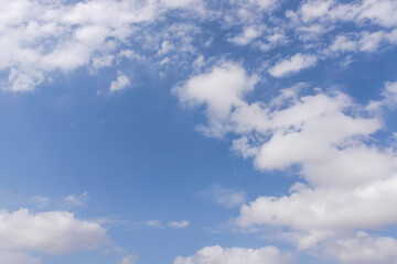 Background of blue sky with white clouds. Skyscape. Graphic design