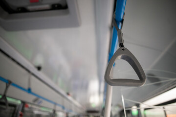 Close up, handrail in a new bus