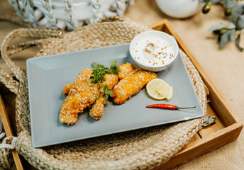 Healthy food for a balanced diet rich in vitamins. Organic and regional products. Crispy chicken, garlic dip