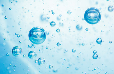 Light blue Air bubbles in alcohol gel. anti virus COVID-19 backdrop. Abstract background about...