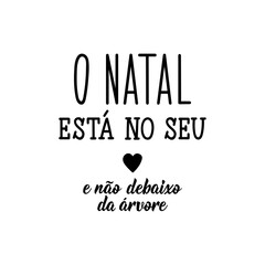 Fototapeta premium Christmas is in yours and not under the tree in Portuguese. Lettering. Ink illustration. Modern brush calligraphy.