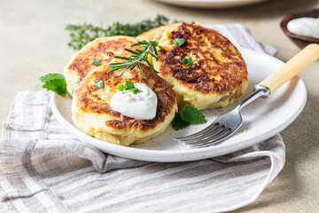 Delicious vegetable cutlets with potato and mushroom served with aromatic herbs and sauce. Healthy diet food concept. Vegan food.