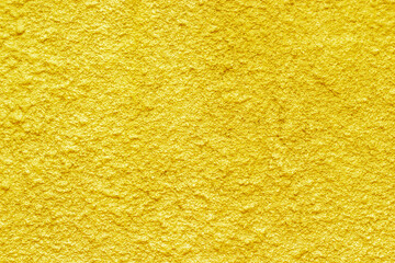 Gold concrete wall texture or background  and copy space.