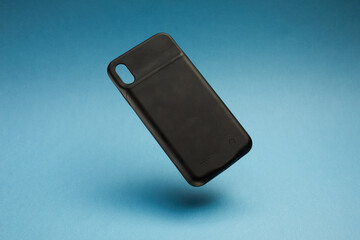  Protective black silicone cases for phone isolated on colorful background 