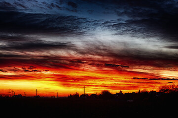 Sonnenuntergang mit Strommast