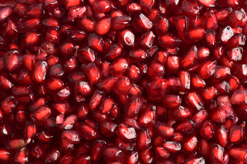 Top view of pomegranate texture background, fresh pomegranate seeds, 