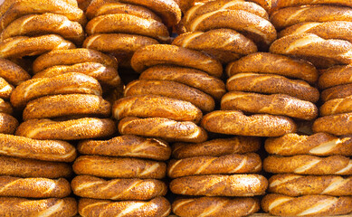 Turkish simit bread. Traditional Turkish bagel with sesame seeds sold in the streets. Turkish street food
