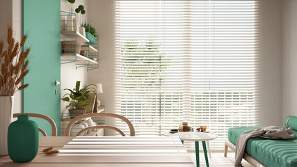 Cosy wooden sustainable living room in green tones. Dining table with vases and ears of grain. Sofa, two coffee tables with teapot and tea cup. Environmental friendly interior design