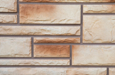 Structural brown brick wall. Close-up.