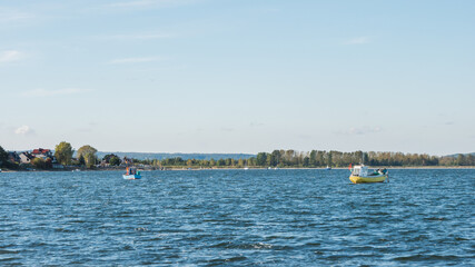 Fototapeta na wymiar Small boat on blue sea. Relaxing image. 