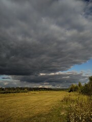 Fototapeta premium storm clouds over the field
