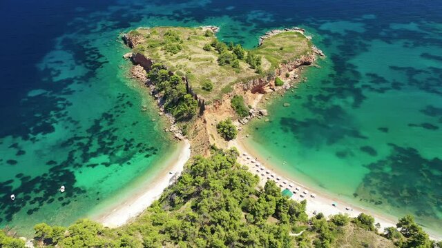 Aerial drone video of paradise beaches in Kokinokastro area with crystal clear turquoise sea, Alonissos island, Sporades, Greece 