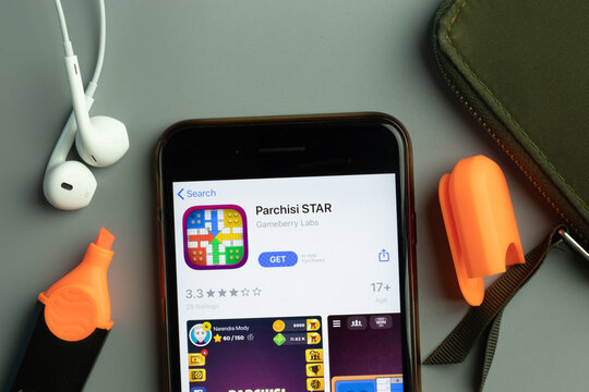 New York, USA - 26 October 2020: Parchisi STAR mobile app icon logo on phone screen close-up, Illustrative Editorial