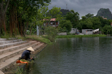 cambodian fisherman on the river