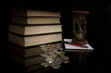 Still life with books and coins