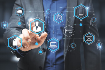 Businessman using glowing global business interface