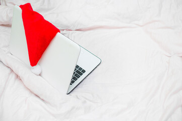 Christmas shopping online with a credit card and laptop for the Christmas holidays.
