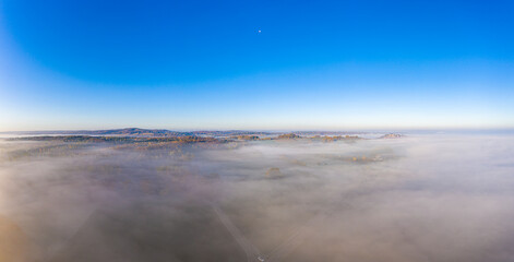 Drone image of morning ground fog over fields in the German province of North Hesse near the village of Rhoden