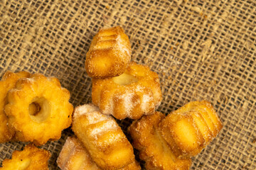 Homemade shortbread cookies on coarse burlap. Close up. Tea party.