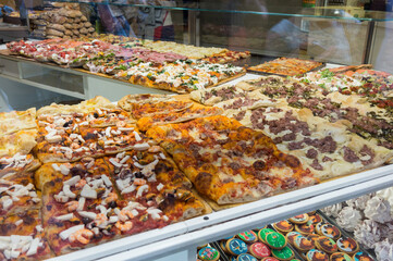 BERGAMO, ITALY - SEPTEMBER 8, 2019: Italian pizza shop in Bergamo old town, Italy