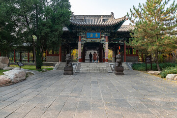 Fototapeta premium In autumn, ancient building lofts and ginkgo trees are in Jinci Park, Taiyuan, Shanxi, China