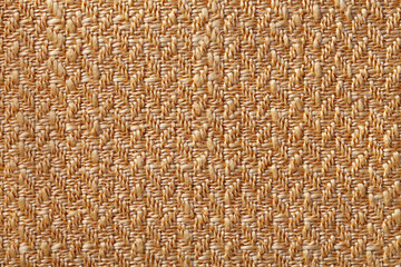 Dark orange wicker textile background. Structure of the light brown woven fabric