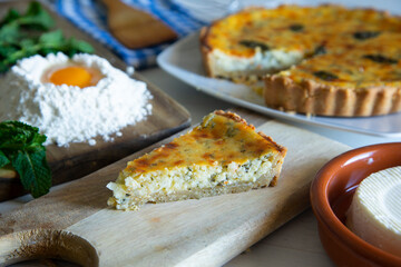 Flaó traditional dessert from Ibiza. The cheesecake is a unique combination of flavors — anise and mint.  The filling is made from fresh cheese (or ricotta and mascarpone), eggs and chopped mint.