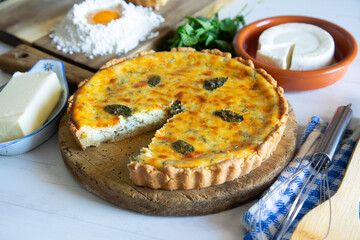 Flaó traditional dessert from Ibiza. The cheesecake is a unique combination of flavors — anise and mint.  The filling is made from fresh cheese (or ricotta and mascarpone), eggs and chopped mint.
