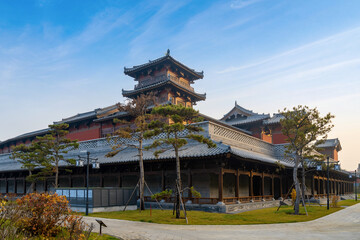 Fototapeta premium In autumn, ancient building lofts and ginkgo trees are in Jinci Park, Taiyuan, Shanxi, China