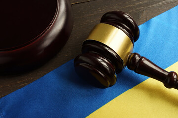 Ukrainian flag and gavel in the court as symbol of justice in Ukraine.