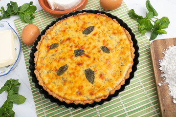 Flaó traditional dessert from Ibiza. The cheesecake is a unique combination of flavors — anise and mint.  The filling is made from fresh cheese (or ricotta and mascarpone), eggs and chopped mint.