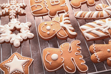 Delicious Christmas cookies on cooling rack, closeup