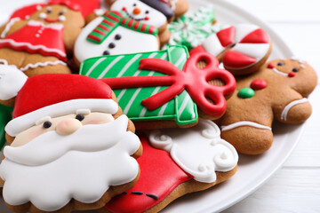 Delicious Christmas cookies on plate, closeup view