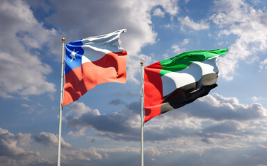 Beautiful national state flags of UAE United Arab Emirates and Chile together at the sky background. 3D artwork concept.