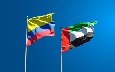 Beautiful national state flags of UAE United Arab Emirates and Colombia together at the sky background. 3D artwork concept.