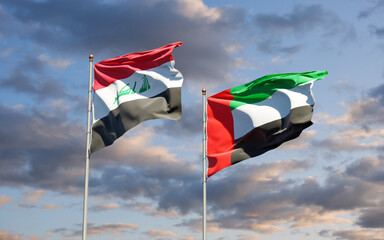 Beautiful national state flags of Iraq and UAE United Arab Emirates together at the sky background. 3D artwork concept.