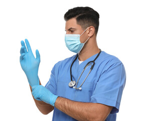 Doctor in protective mask putting on medical gloves against white background