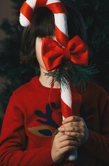Child wth giant sugar stick