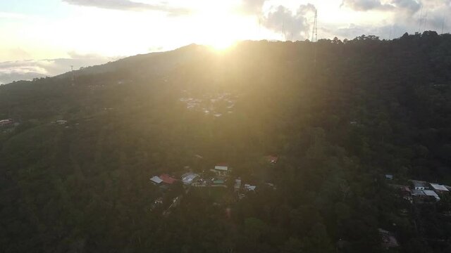 Golden Sunset Over San Salvador Volcano In The City Of San Salvador, El Salvador. - tilt upshot
