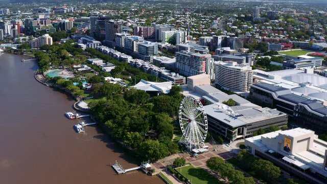 Ferris Wheel - Wheel Of Brisbane At Park In South Bank, Brisbane, Queensland, Australia. - Aerial Drone Shot