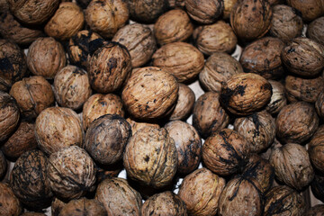 Walnuts background, natural brown color